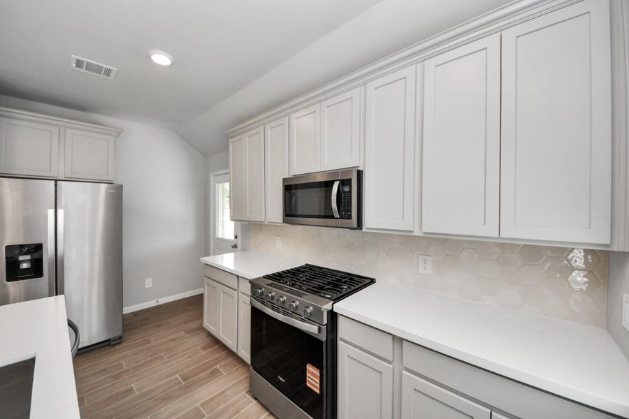 Furnished interior view inside a new home in , Tomball (Image 4).