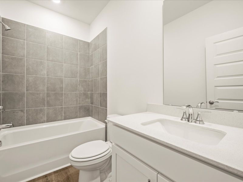Furnished interior view inside a new home in The Coves at Lakes of Cane Bay, Summerville (Image 13).