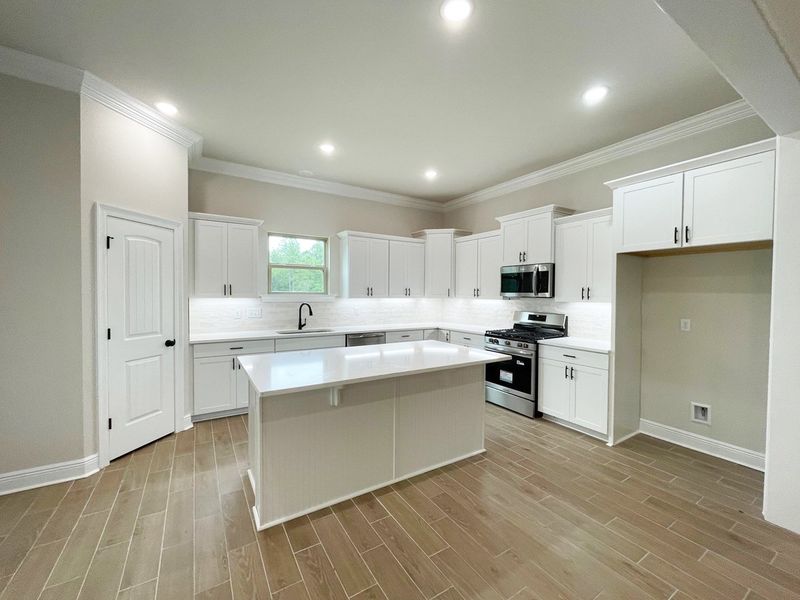 Furnished interior view inside a new home in Iron Rock, Cantonment (Image 4).