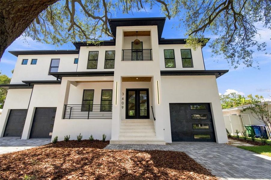 Front exterior of a new home in , Tampa, FL, highlighting curb appeal (Image 1). Front exterior of a new home in , Tampa, FL, highlighting curb appeal (Image 1).