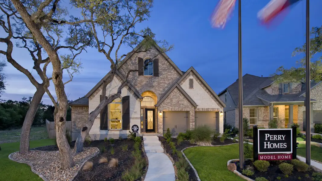 Front exterior of a new home in Elyson, Katy, TX, highlighting curb appeal (Image 2).