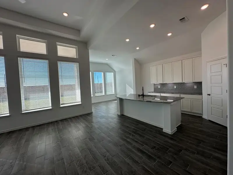 Furnished interior view inside a new home in , Iowa Colony (Image 6).