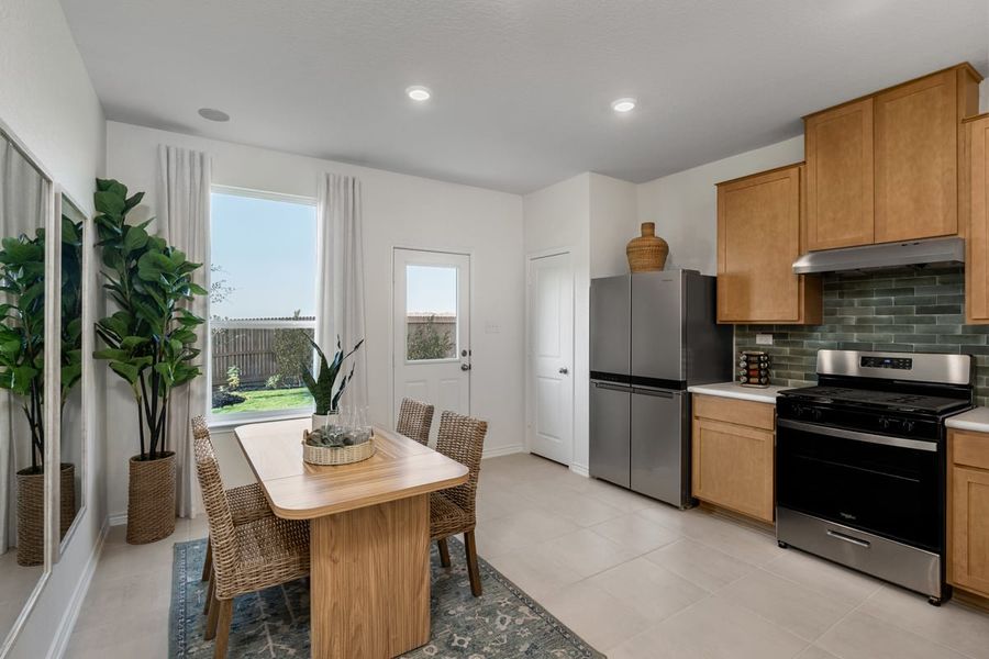 Representative furnished interior of a home built from the 1243 Modeled by KB Home in Punta Verde, Converse (Image 6).