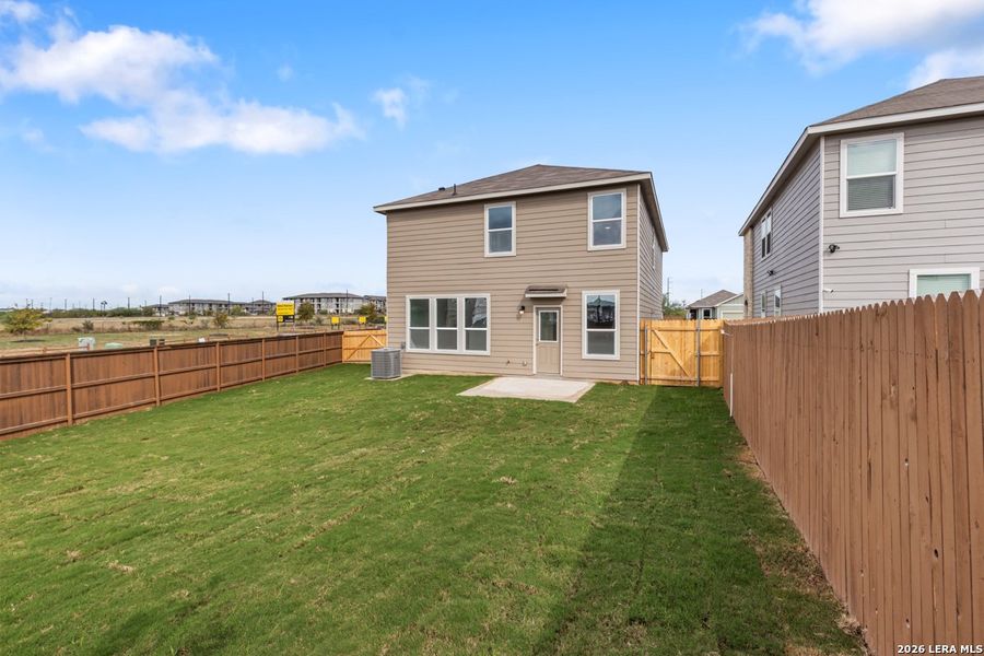 Exterior details and patio area of a home in Southton Cove, Elmendorf (Image 3).