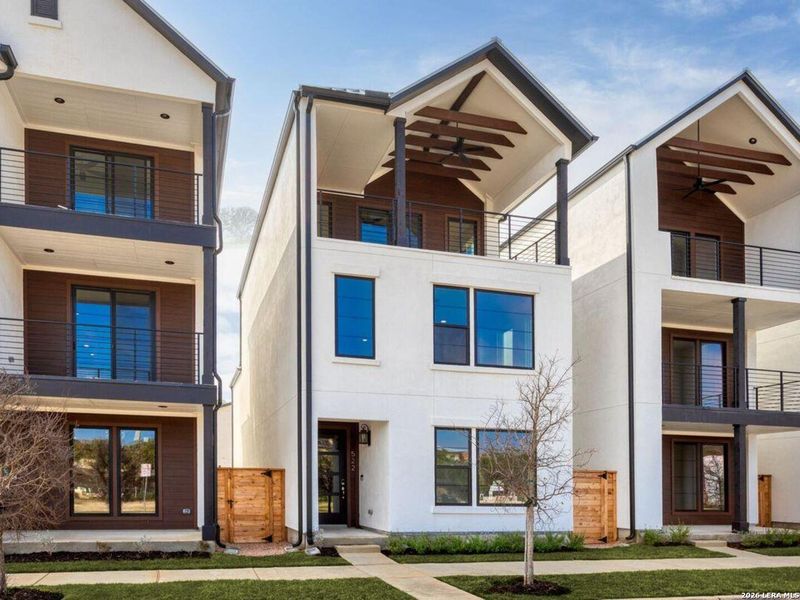 Front exterior of a new home in Victoria Commons, San Antonio, TX, highlighting curb appeal (Image 24).