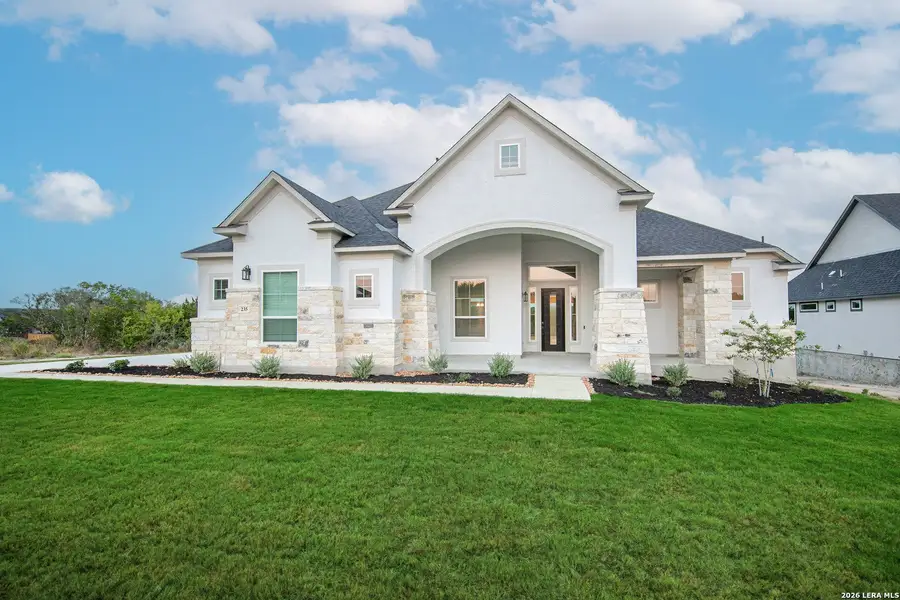 Front exterior of a new home in Caliza Reserve, Boerne, TX, highlighting curb appeal (Image 2). Front exterior of a new home in Caliza Reserve, Boerne, TX, highlighting curb appeal (Image 2).