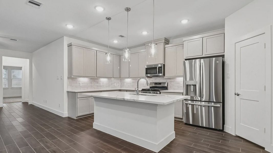 Furnished interior view inside a new home in Meridiana Townhomes, Manvel (Image 12).
