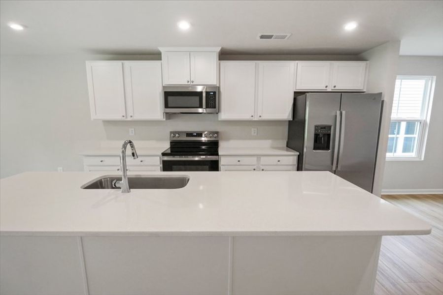 Furnished interior view inside a new home in Baxter Village, Greenville (Image 5). Furnished interior view inside a new home in Baxter Village, Greenville (Image 5).