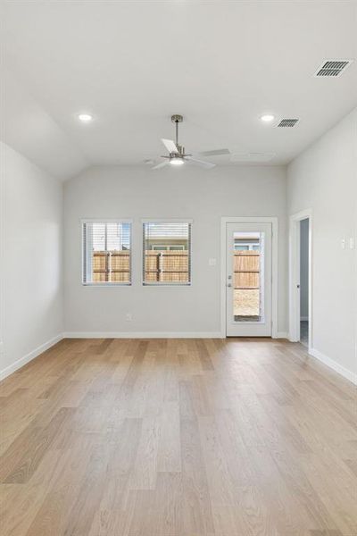 Living Room in the Cedar home plan by Trophy Signature Homes – REPRESENTATIVE PHOTO