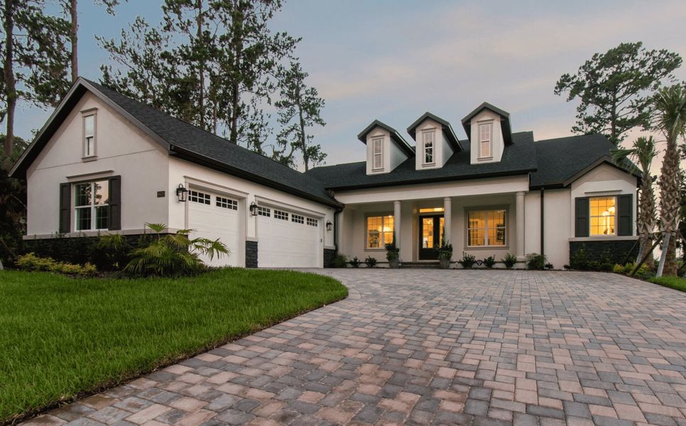 Representative exterior photo of a completed home built from the Sawgrass by Vitale Homes in Hidden Ridge, New Port Richey, FL (Image 1). Representative exterior photo of a completed home built from the Sawgrass by Vitale Homes in Hidden Ridge, New Port Richey, FL (Image 1).