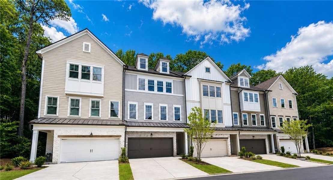 Front exterior of a new home in Devin's Shire, Kennesaw, GA, highlighting curb appeal (Image 23).