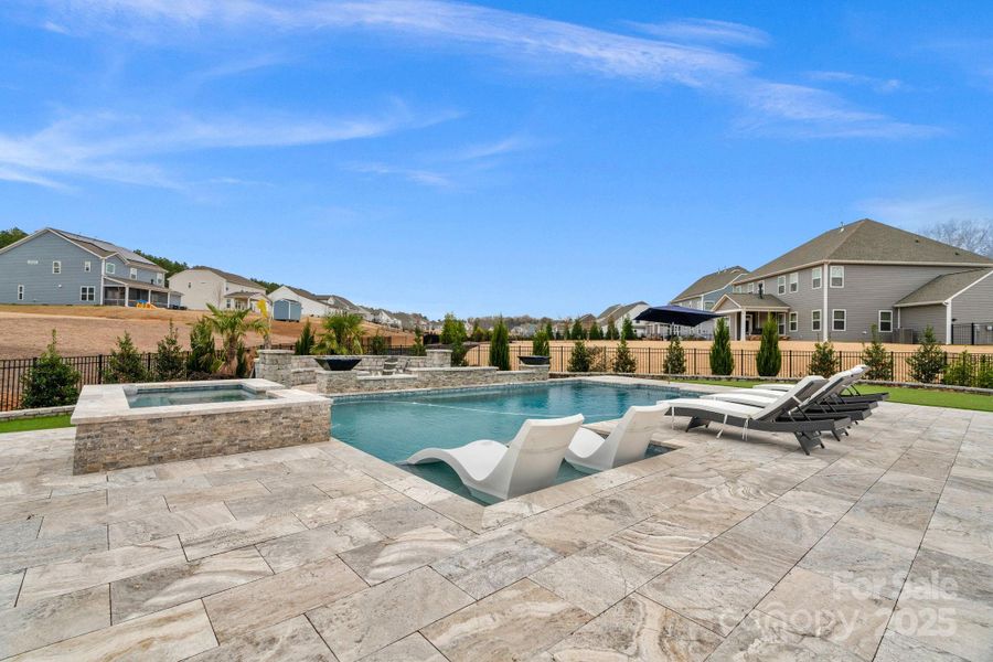 Spectacular in-ground pool & spa with Travertine decking