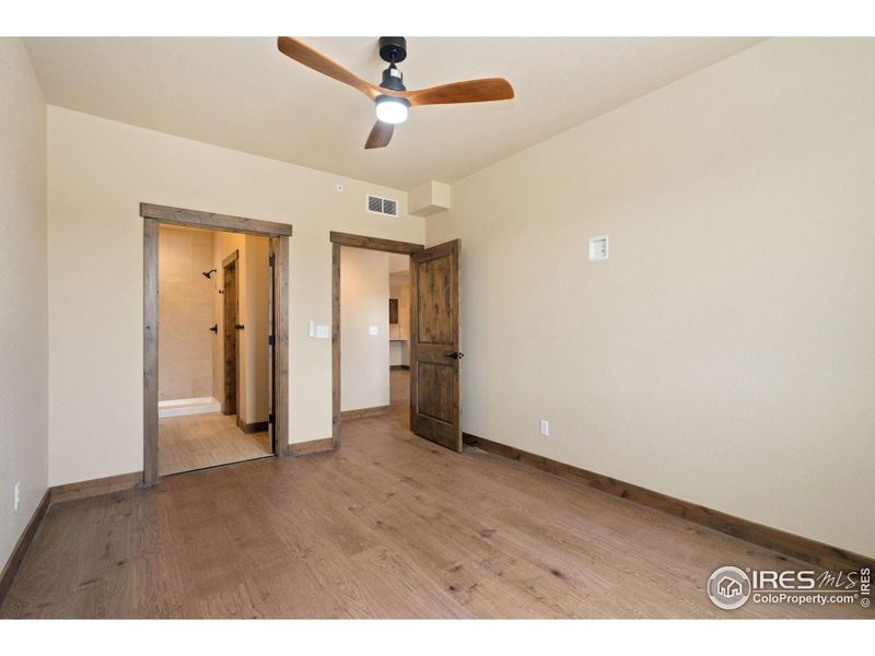 Main level primary bedroom with en-suite bathroom