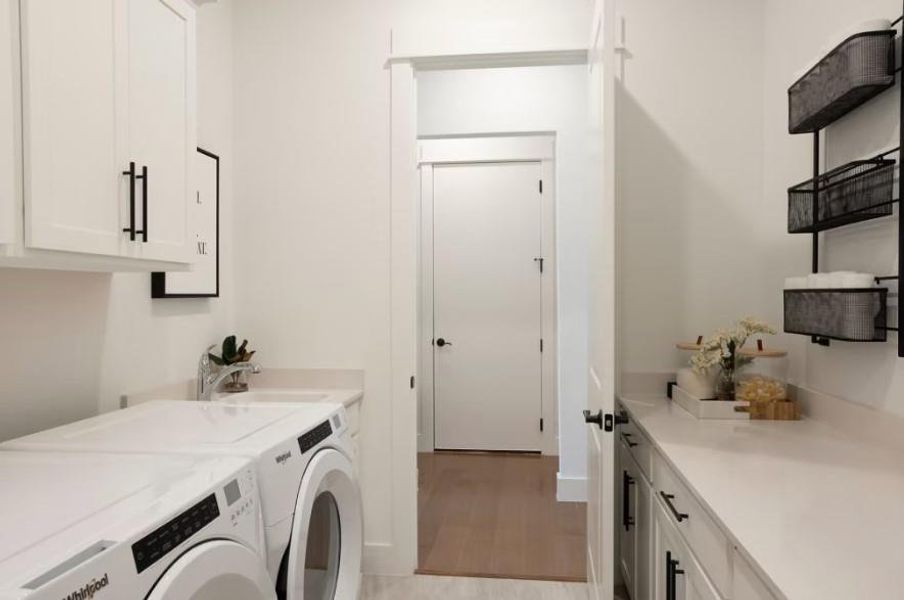 Photo of Pulte model home with same floor plan, not of actual home listed. Photo of Pulte model home with same floor plan, not of actual home listed.