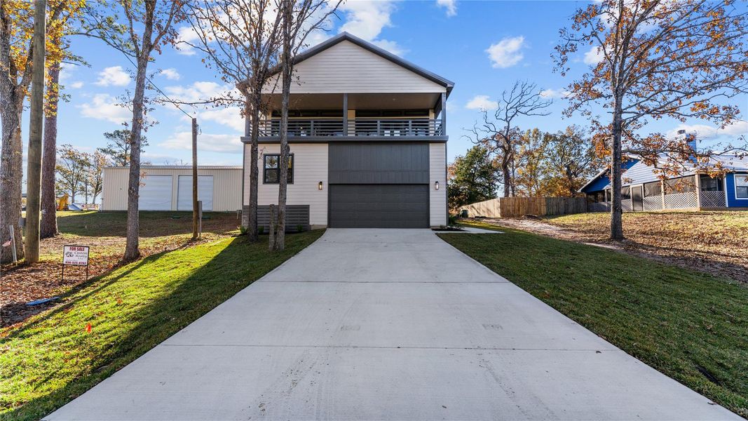 Front exterior of a new home in , Livingston, TX, highlighting curb appeal (Image 1). Front exterior of a new home in , Livingston, TX, highlighting curb appeal (Image 1).