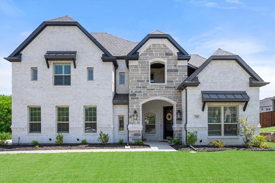 Front exterior of a new home in , Sunnyvale, TX, highlighting curb appeal (Image 19). Front exterior of a new home in , Sunnyvale, TX, highlighting curb appeal (Image 19).