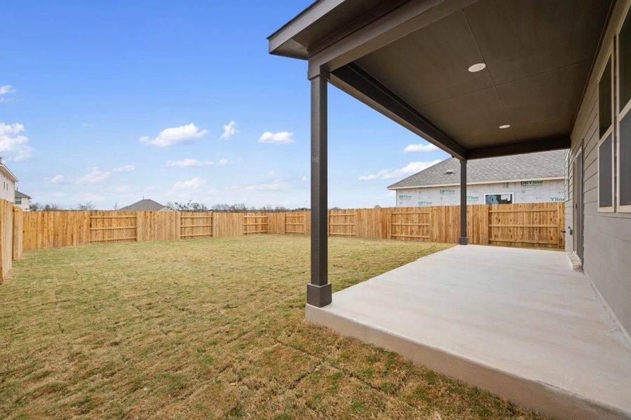 Exterior details and patio area of a home in Patterson Ranch, Georgetown (Image 24).