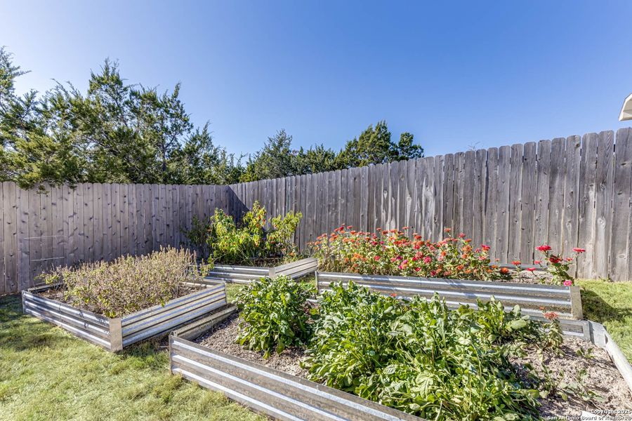 Exterior details and patio area of a home in Johnson Ranch: Brookstone II Collection, Bulverde (Image 25).