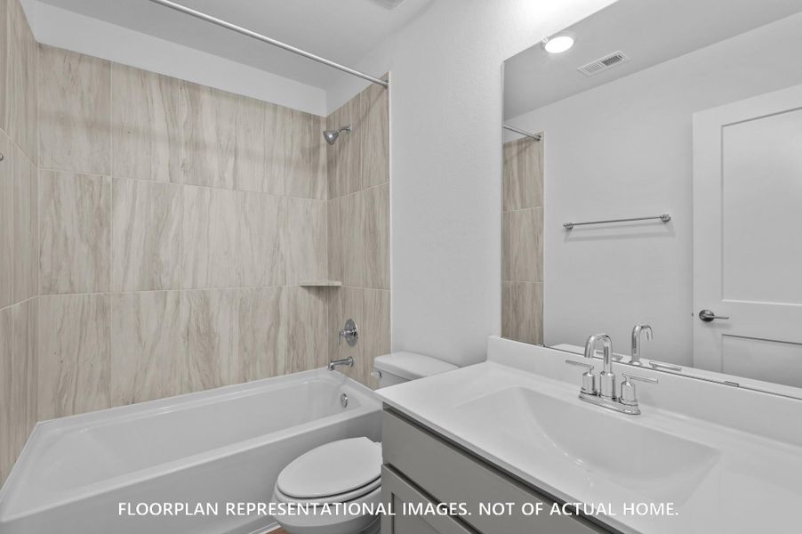 Furnished interior view inside a new home in Pinewood at Grand Texas, New Caney (Image 6).