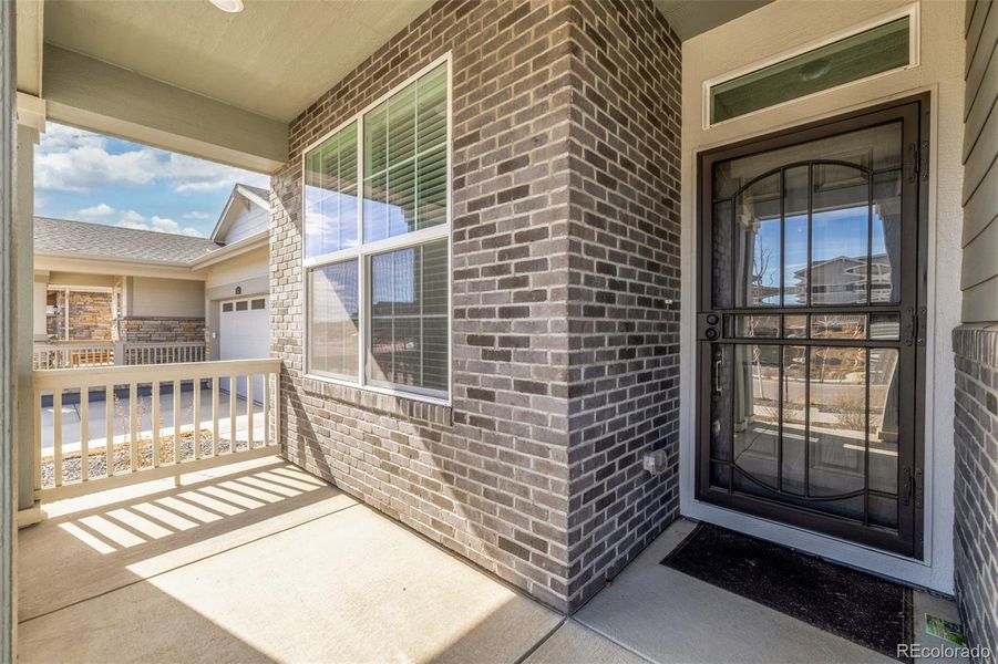 Exterior details and patio area of a home in Green Valley Ranch Active Adult, Aurora (Image 29).