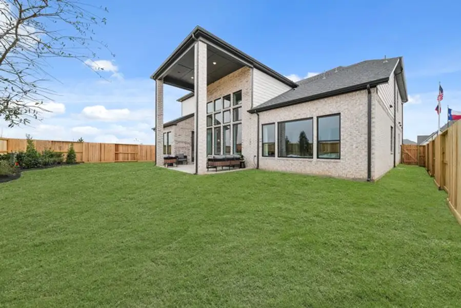 Exterior details and patio area of a home in Meridiana 40', 65', Manvel (Image 22). Exterior details and patio area of a home in Meridiana 40', 65', Manvel (Image 22).