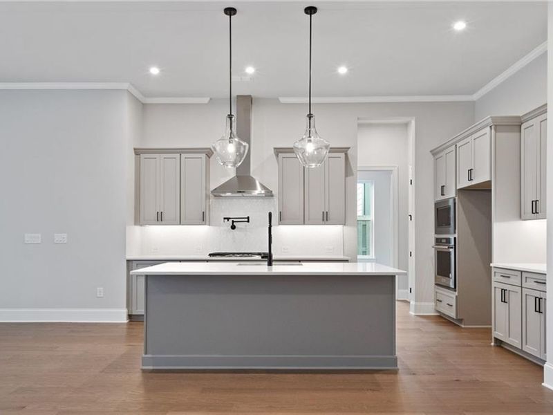 Furnished interior view inside a new home in The Village at Towne Lake, Woodstock (Image 5).