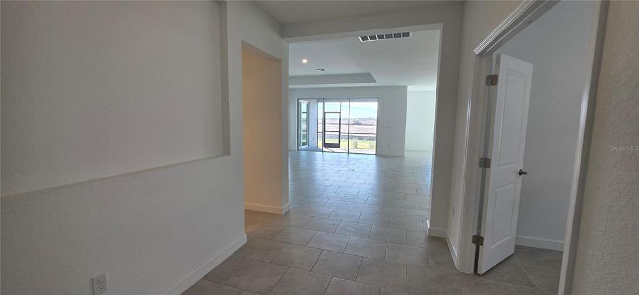 Spacious, unfurnished interior of a new home in Rye Ranch: Manor Homes, Parrish (Image 14).