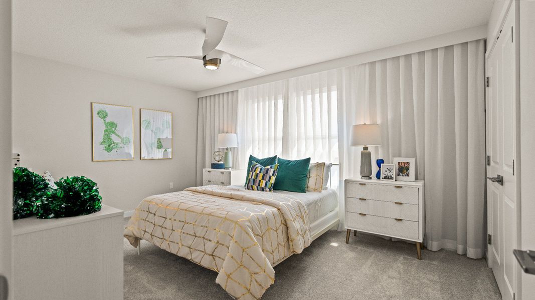 Secondary Bedroom in the Model Highbourne by DRB Homes in Hamilton Bluff located in Haines City, FL. Secondary Bedroom in the Model Highbourne by DRB Homes in Hamilton Bluff located in Haines City, FL.