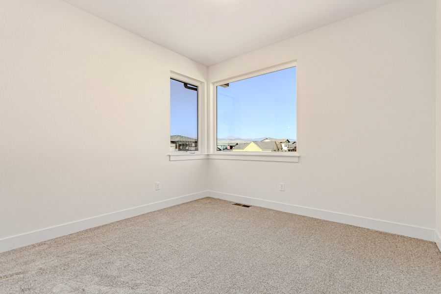 Spacious, unfurnished interior of a new home in West Grange, Longmont (Image 38).