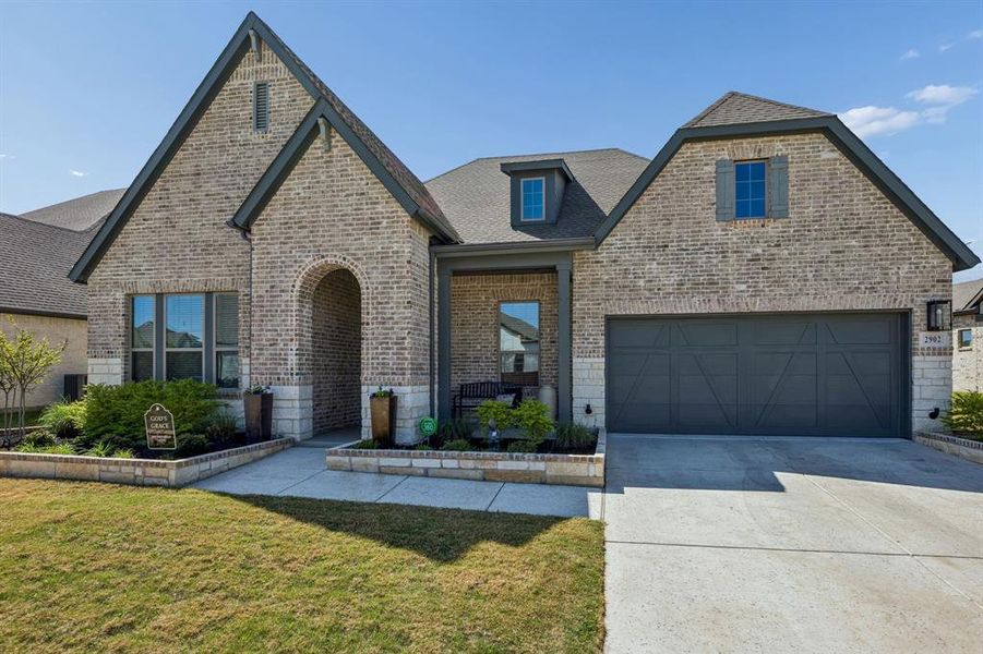Front exterior of a new home in , Mansfield, TX, highlighting curb appeal (Image 20).