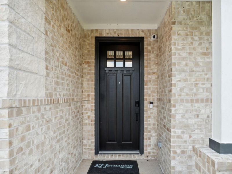 Exterior details and patio area of a home in Tarkington Timbers, Cleveland (Image 2).