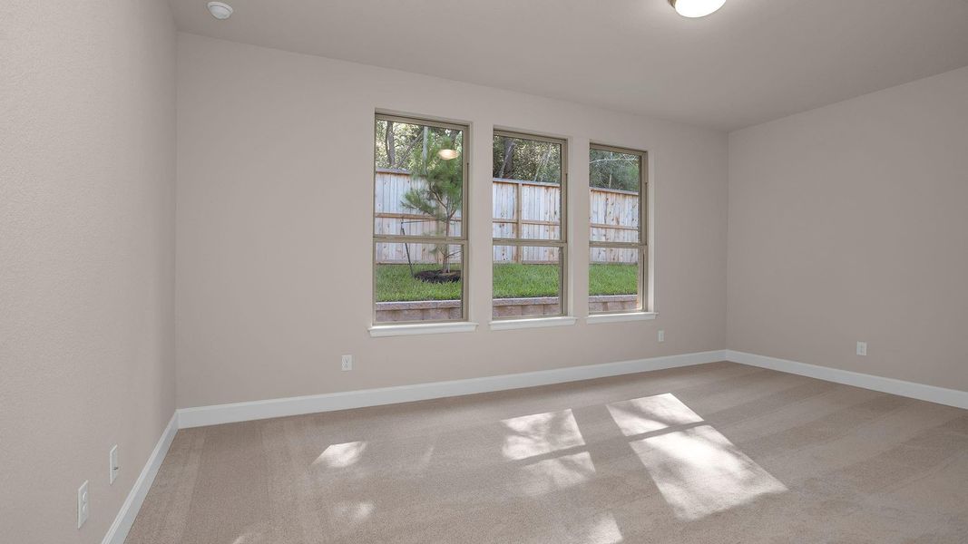 Spacious, unfurnished interior of a new home in The Woodlands Hills 40', Willis (Image 8).