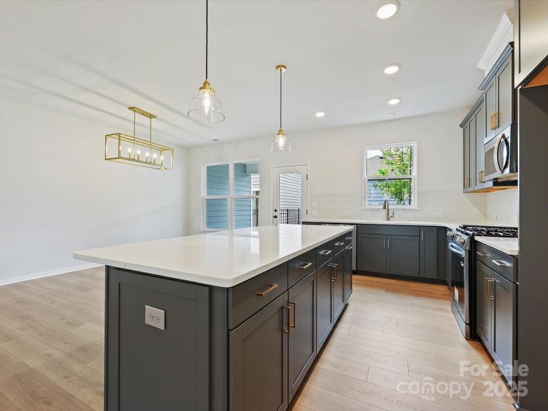 Furnished interior view inside a new home in North Creek Village - Townhomes, Huntersville (Image 7). Furnished interior view inside a new home in North Creek Village - Townhomes, Huntersville (Image 7).