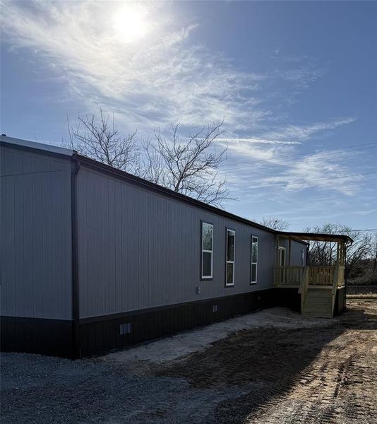 Exterior details and patio area of a home in , Pelican Bay (Image 15).