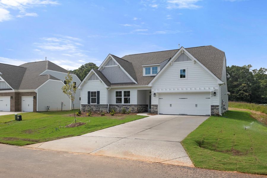 Front exterior of a new home in Grove Park, Clemmons, NC, highlighting curb appeal (Image 24).