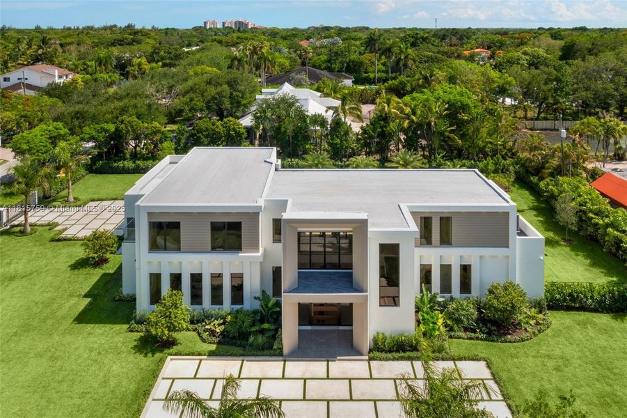 Front exterior of a new home in , Pinecrest, FL, highlighting curb appeal (Image 24).