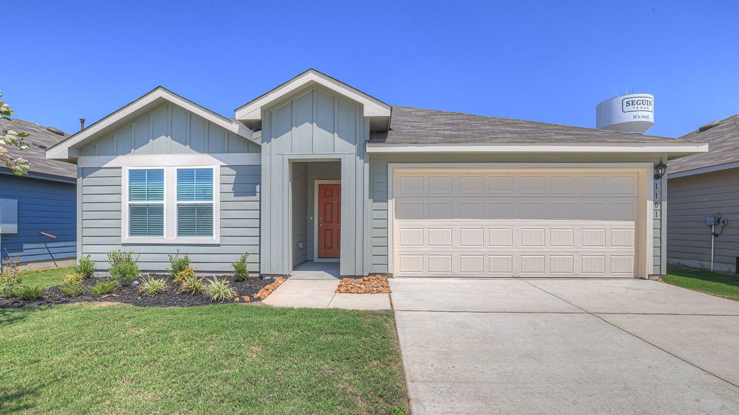Front exterior of a new home in Navarro Fields, Seguin, TX, highlighting curb appeal (Image 1).