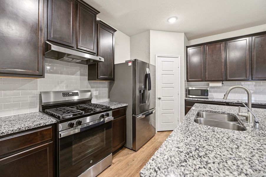Furnished interior view inside a new home in Winding Brook, San Antonio (Image 8).