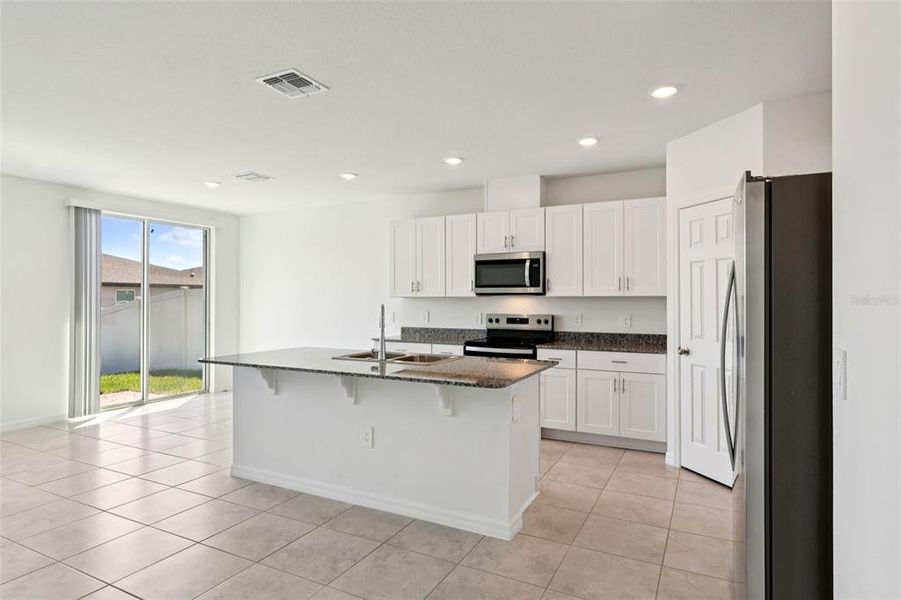 Furnished interior view inside a new home in Deer Run at Crosswinds, Davenport (Image 10).