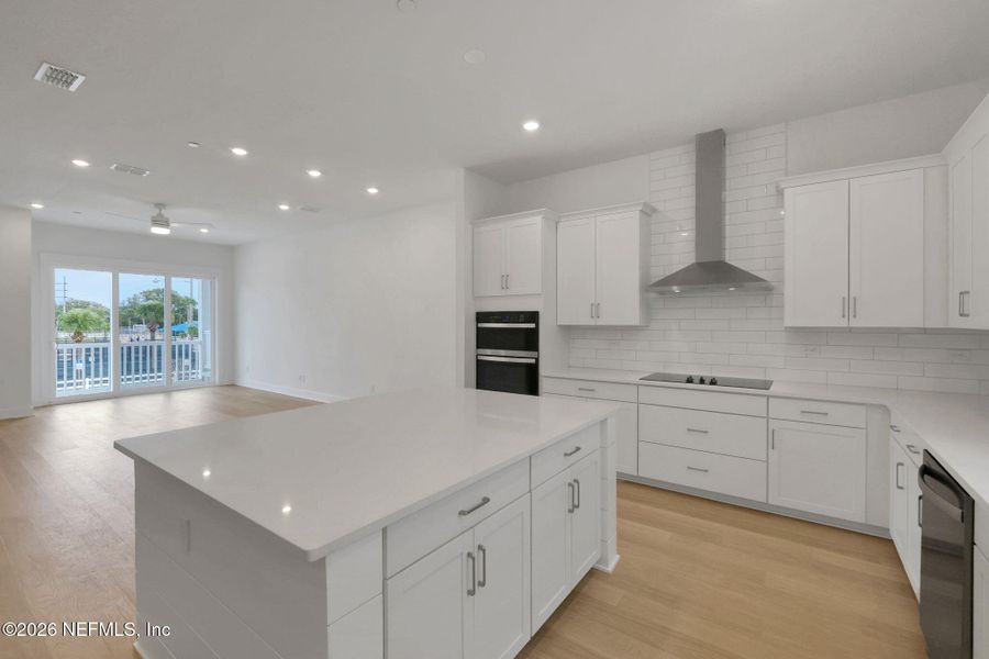 Furnished interior view inside a new home in North Beach Townhomes, Jacksonville Beach (Image 6).