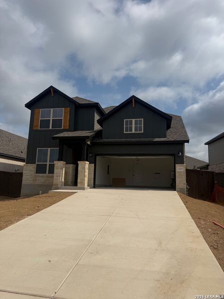 Front exterior of a new home in Bison Ridge, San Antonio, TX, highlighting curb appeal (Image 1). Front exterior of a new home in Bison Ridge, San Antonio, TX, highlighting curb appeal (Image 1).