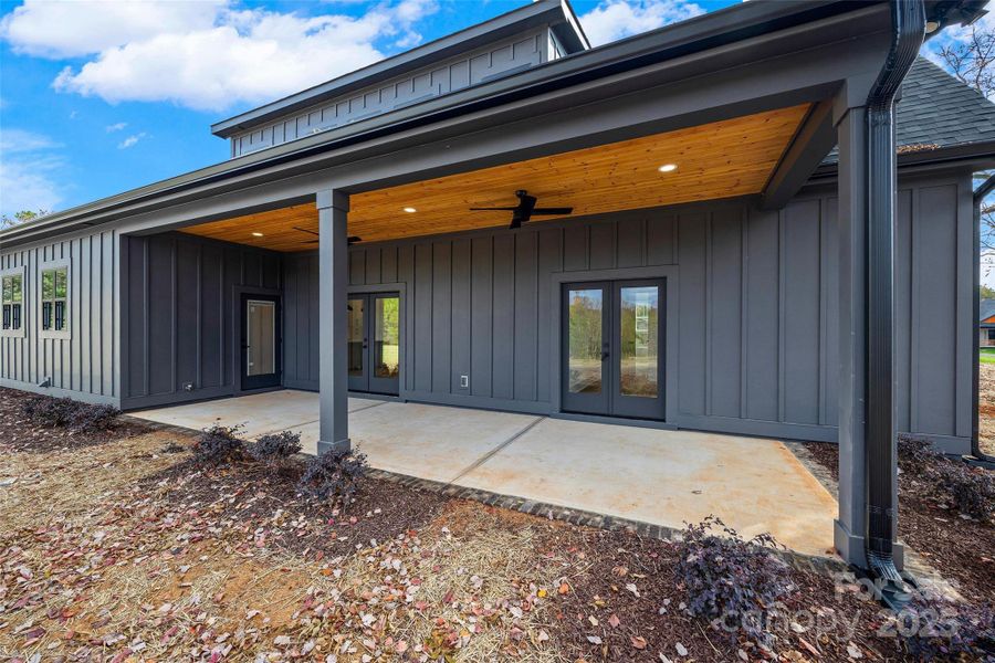 Covered Porch with Wood Panel Ceiling