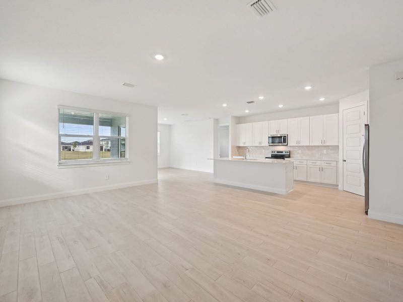 Spacious, unfurnished interior of a new home in Brystol at Wylder - Reserve Series, Port St. Lucie (Image 12).