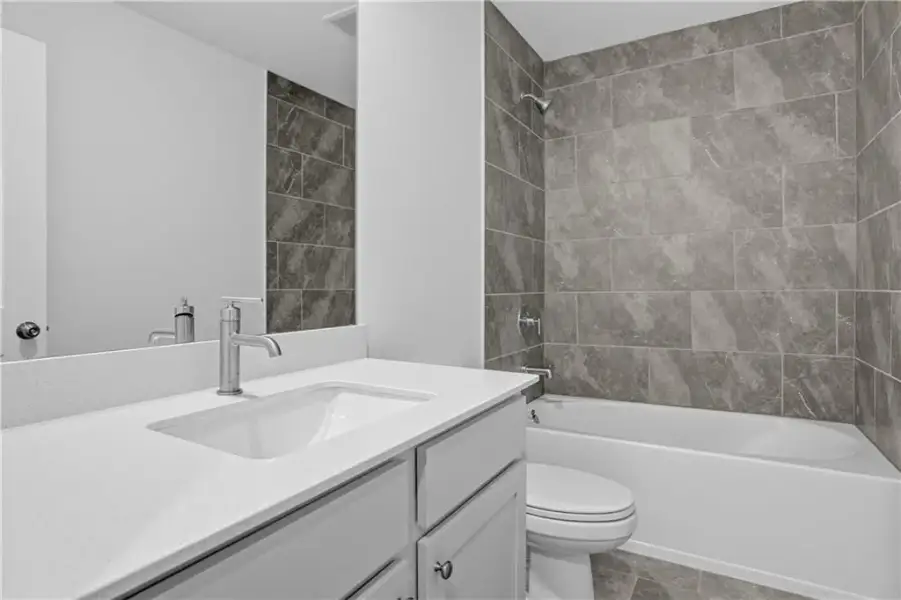 Furnished interior view inside a new home in Towns at Holly Springs, Holly Springs (Image 11).
