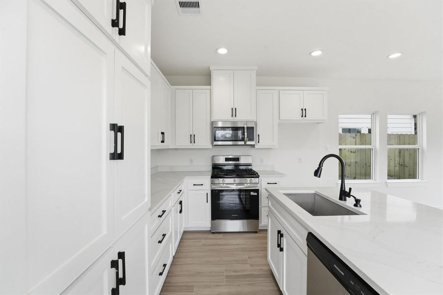 Furnished interior view inside a new home in , La Porte (Image 11).
