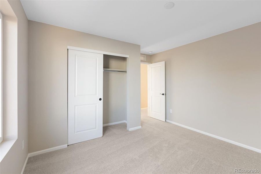 Spacious, unfurnished interior of a new home in The Cottages Collection at Ridgeline Vista, Brighton (Image 25).