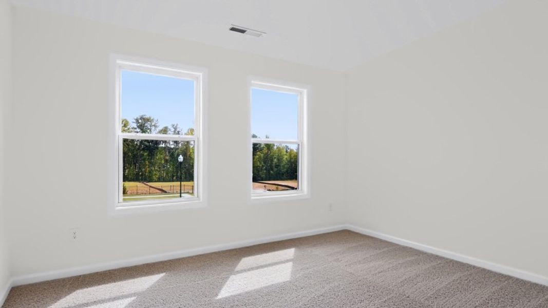 Spacious, unfurnished interior of a new home in The Grove at Winston Pointe, Clayton (Image 23).