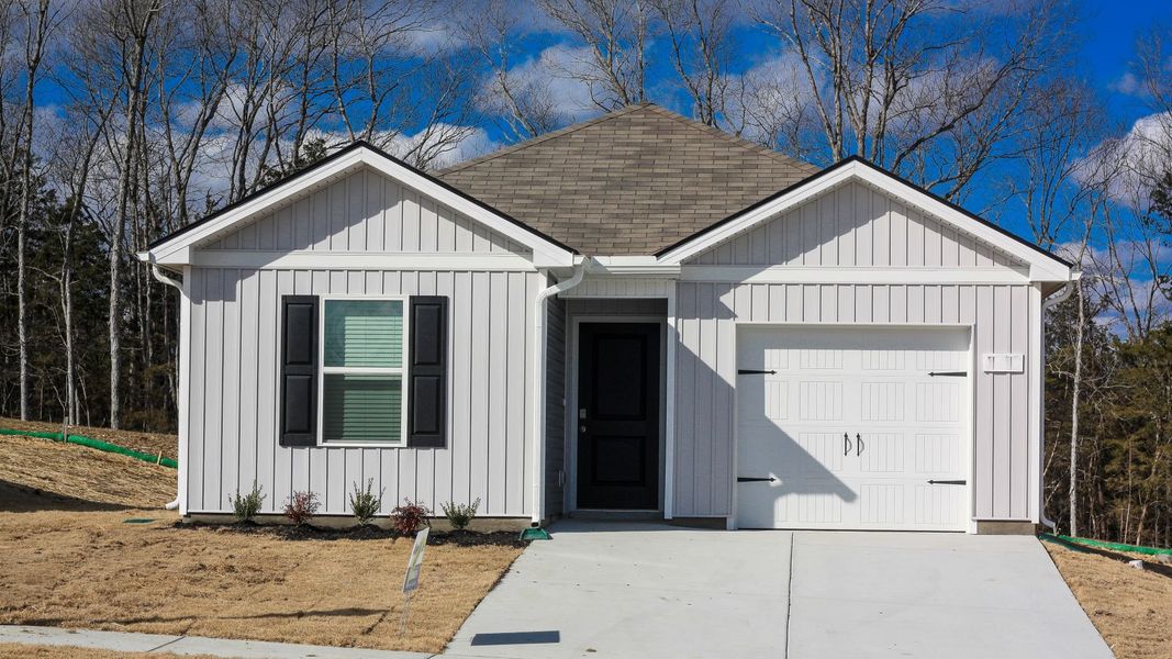 Front exterior of a new home in Saddle Trace, Lewisburg, TN, highlighting curb appeal (Image 18).