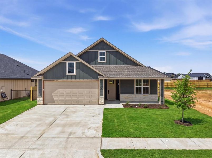 Front exterior of a new home in , Tolar, TX, highlighting curb appeal (Image 27).