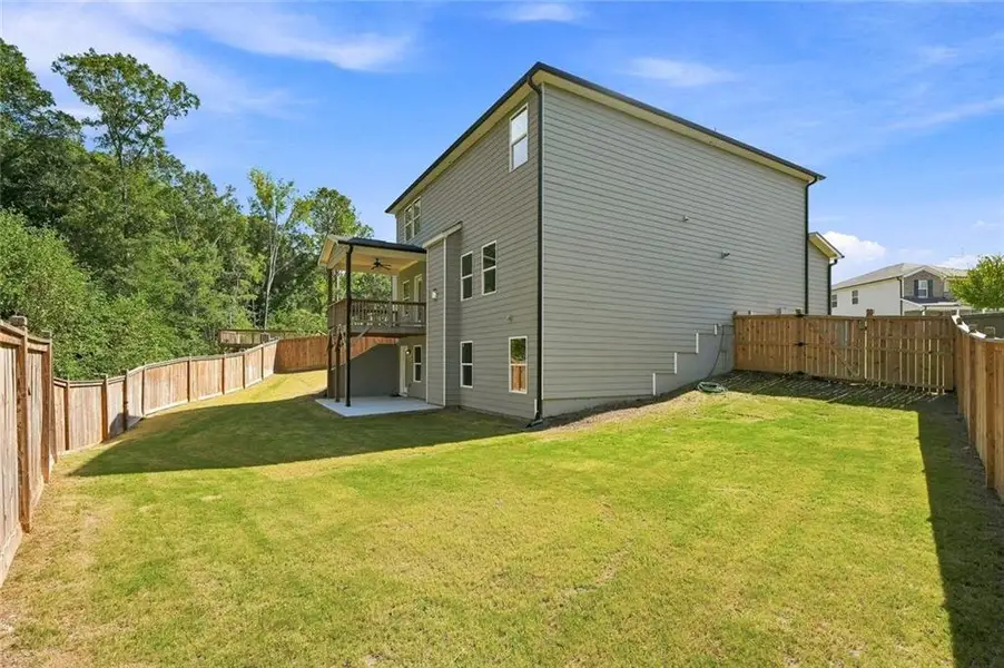 Exterior details and patio area of a home in Little River Falls, Woodstock (Image 3).
